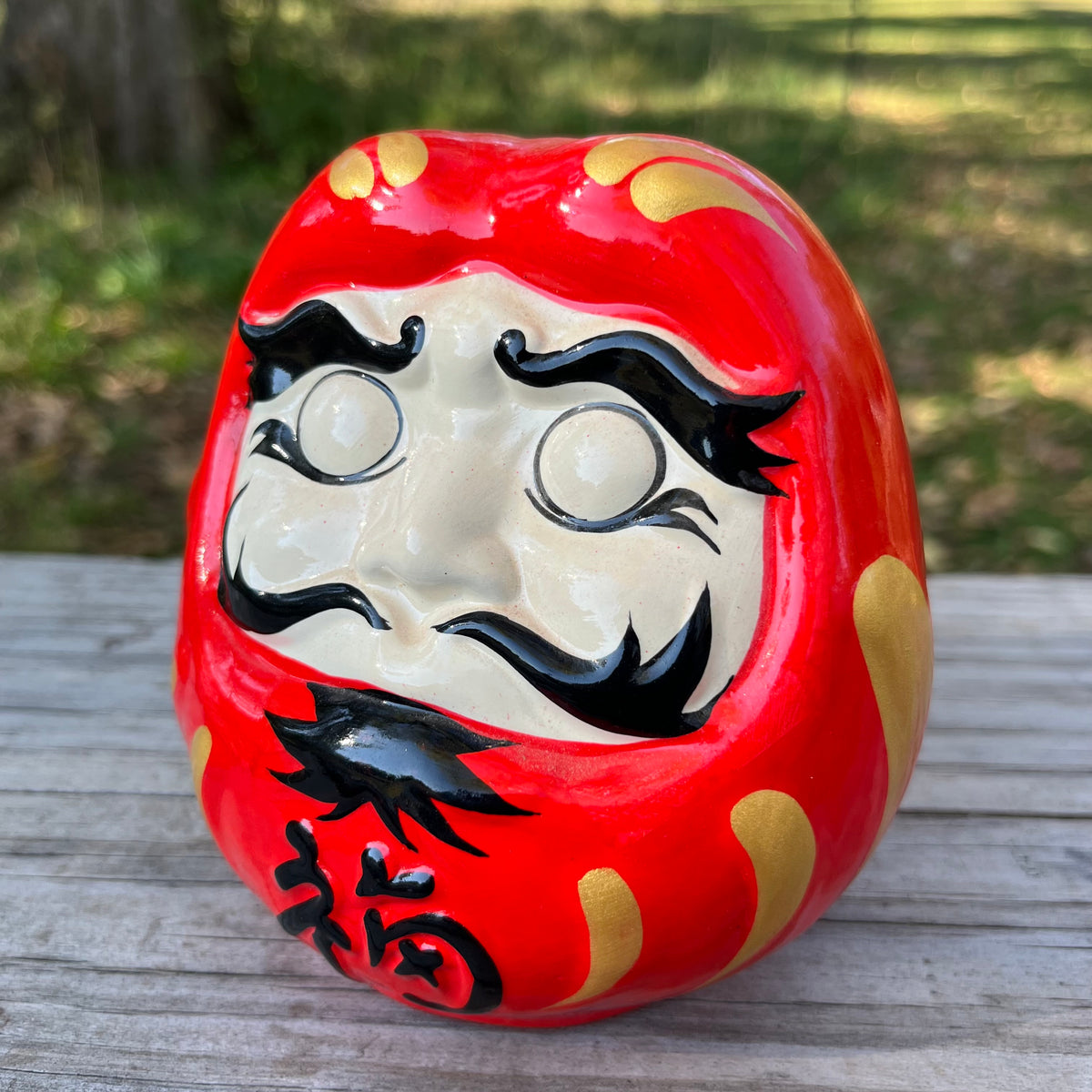 Vintage ceramic Daruma doll.