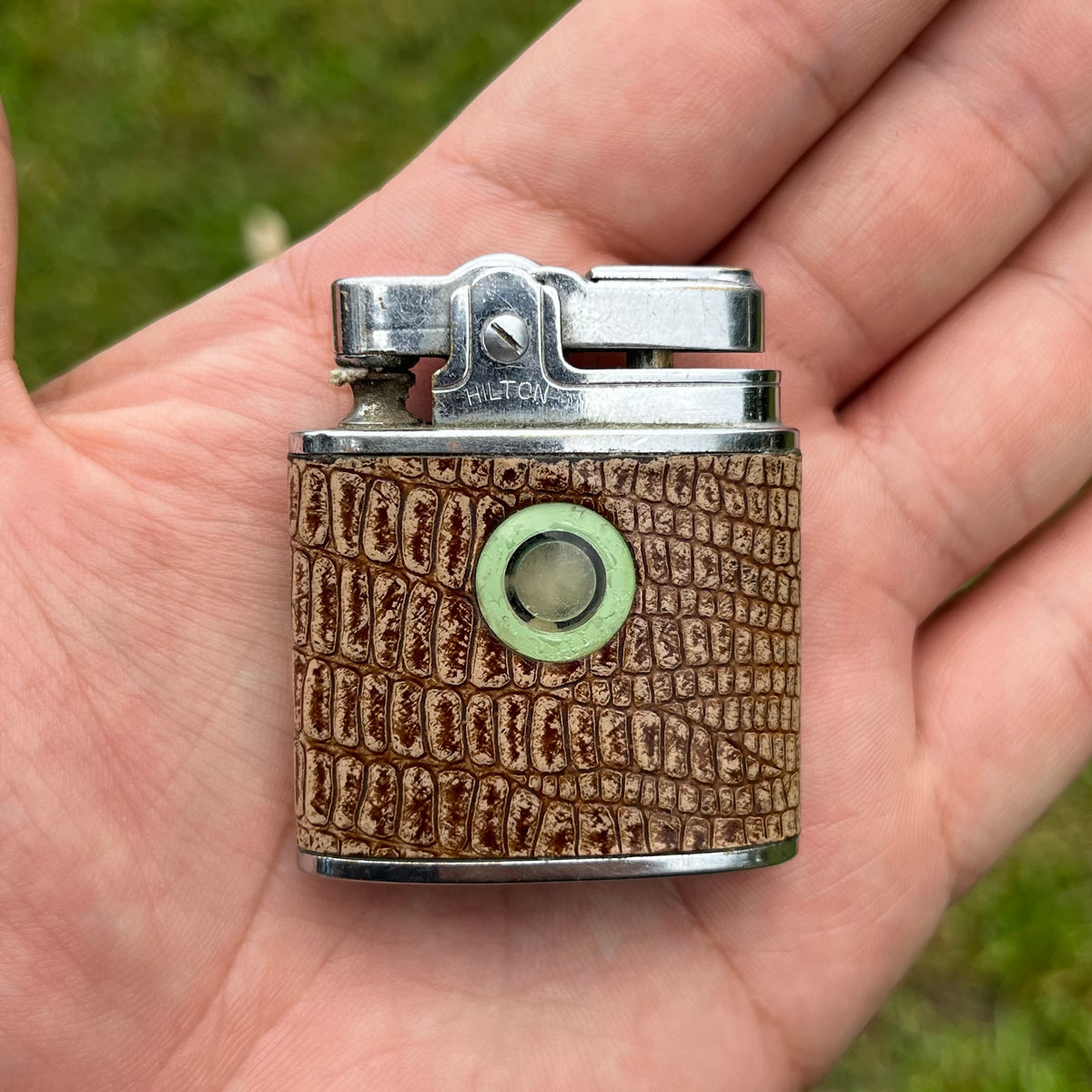 1960s Hilton “Regular” snap lighter.