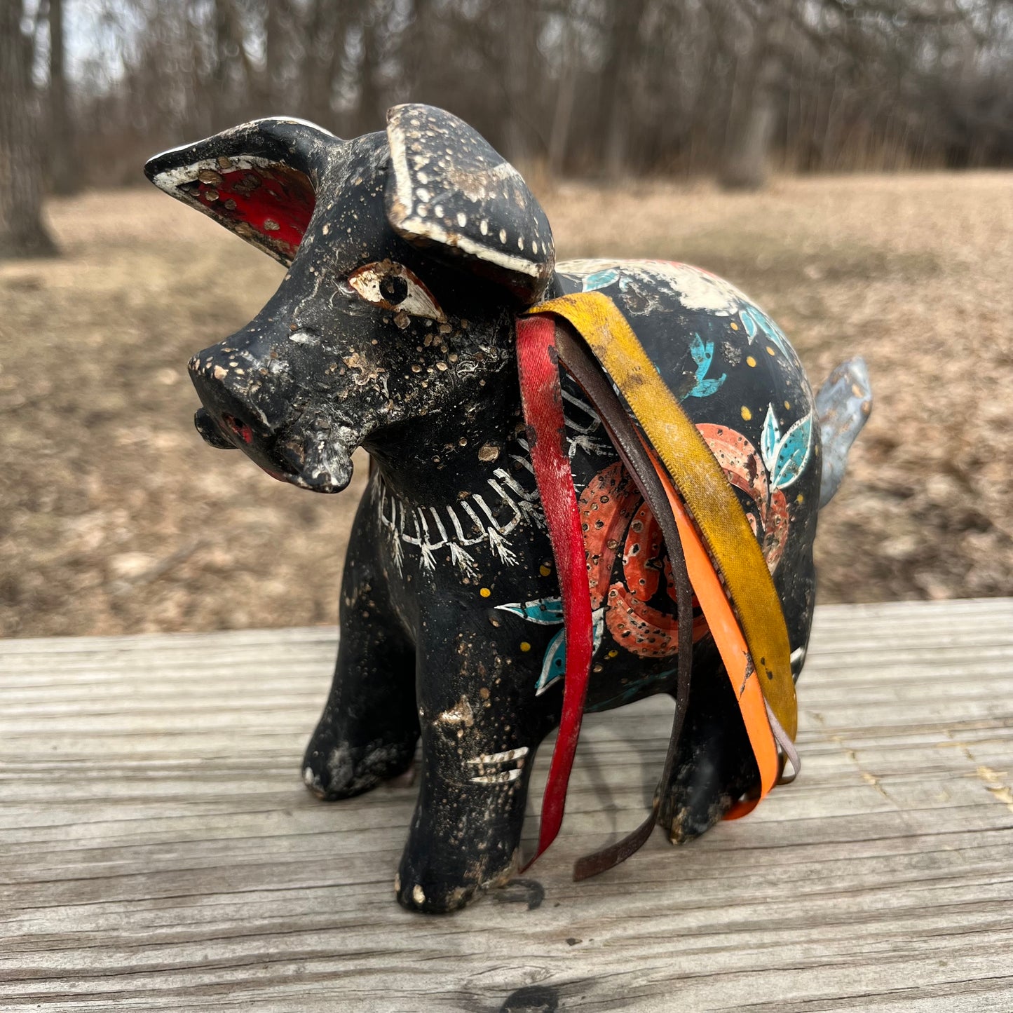 Hand crafted boar gourd maraca.