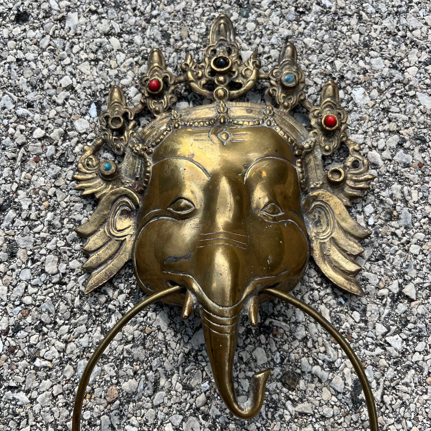 Vintage brass Ganesh cloth holder.