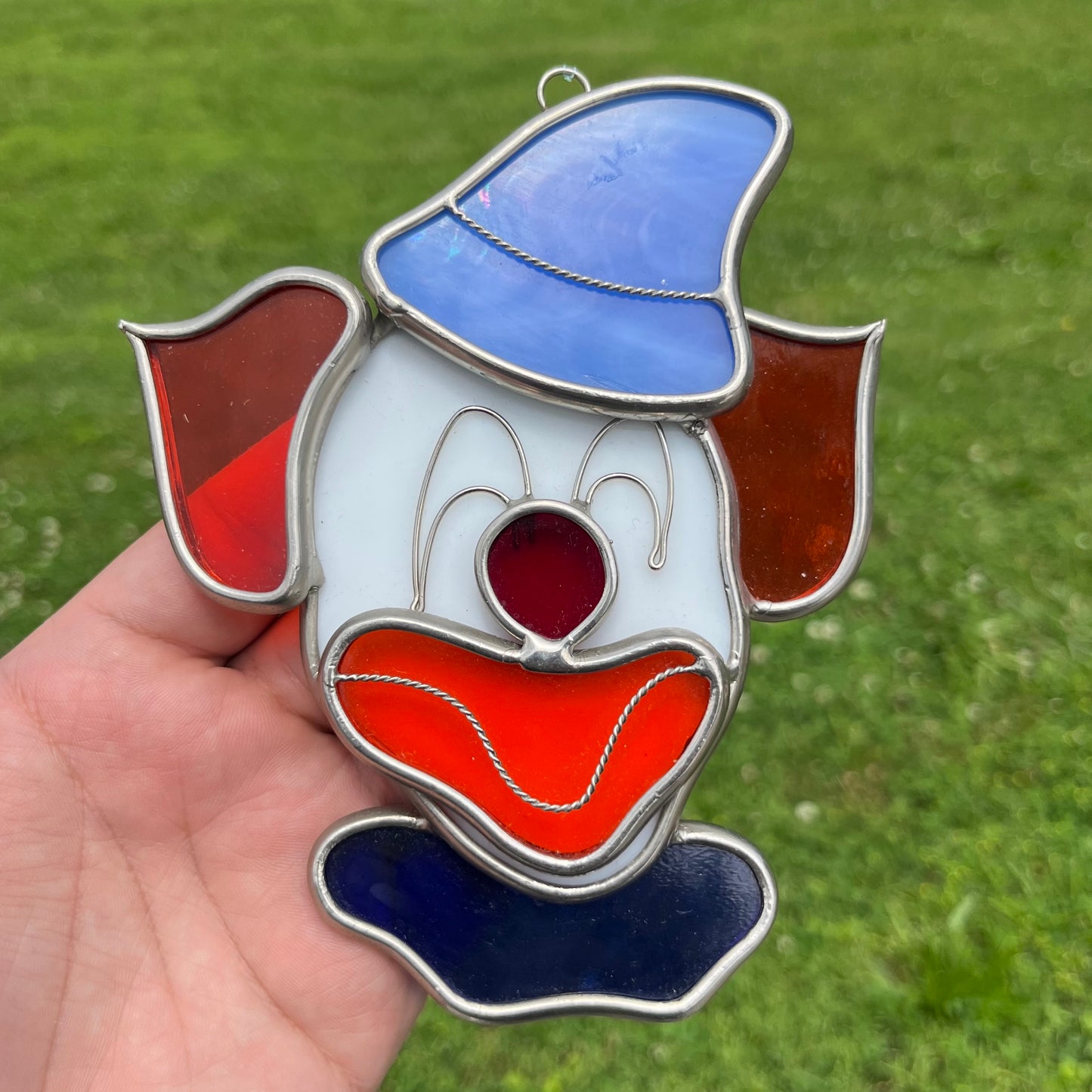Vintage stained glass clown.
