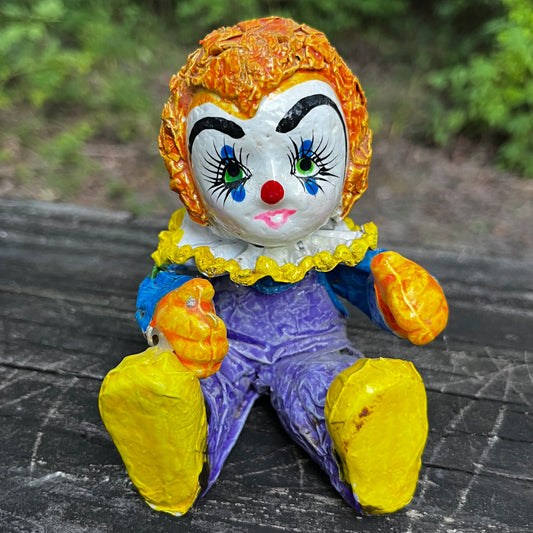 Vintage paper mache clown.
