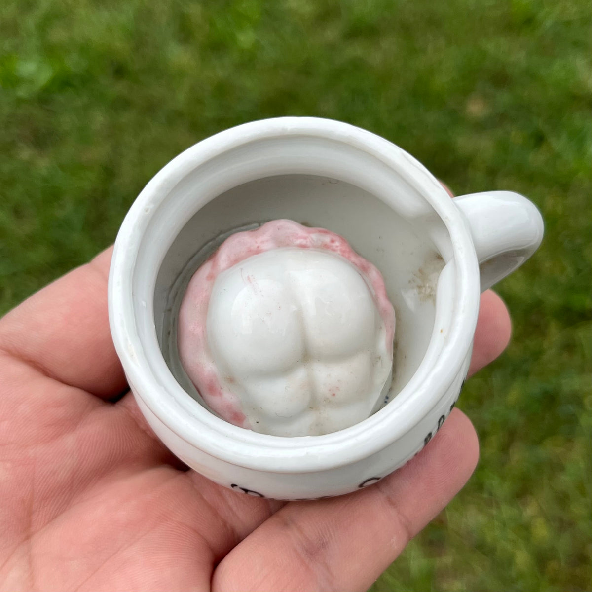 1950s Ceramic “Butt Snuffer” mug.