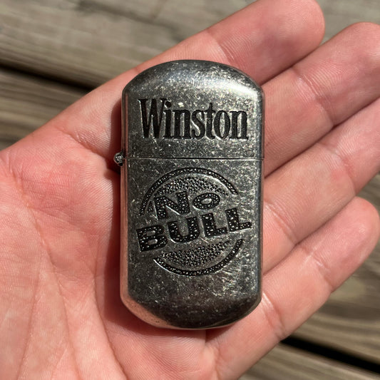 1980s Winston flip lighter.