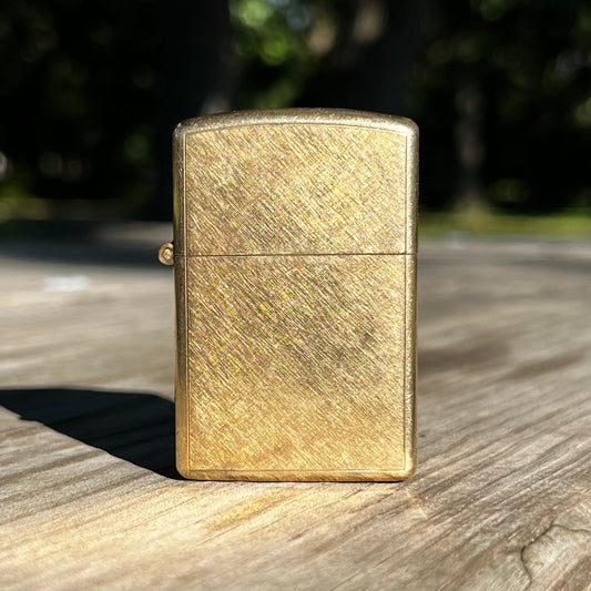 1960s 12 Karat gold filled Anson flip lighter.