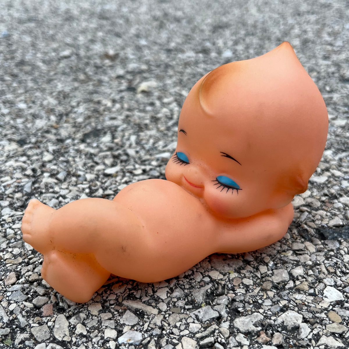 Vintage vinyl sleepy Kewpie.