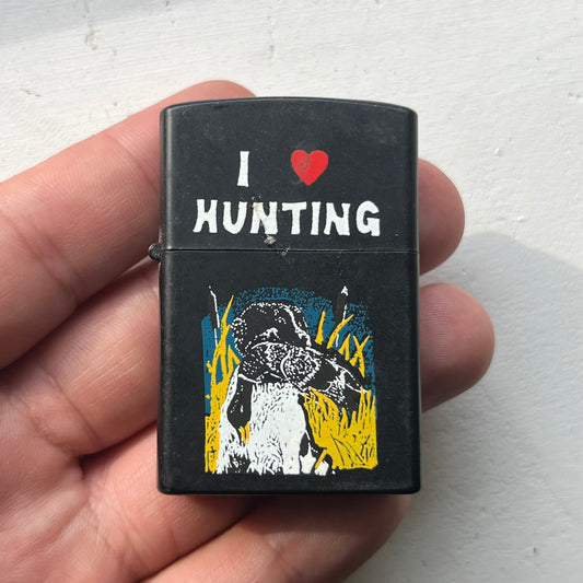 90s “I Love Hunting” flip lighter.