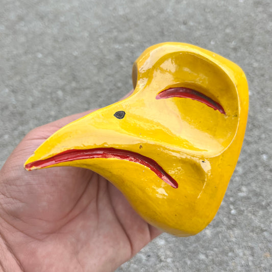 Vintage hand crafted bird mask.