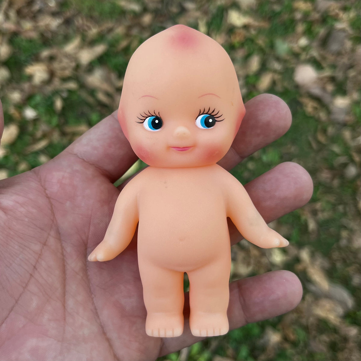 Vintage vinyl Kewpie.