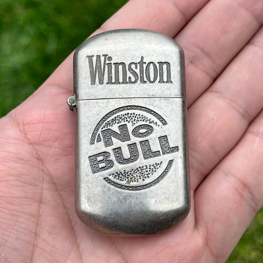 1980s Winston flip lighter.