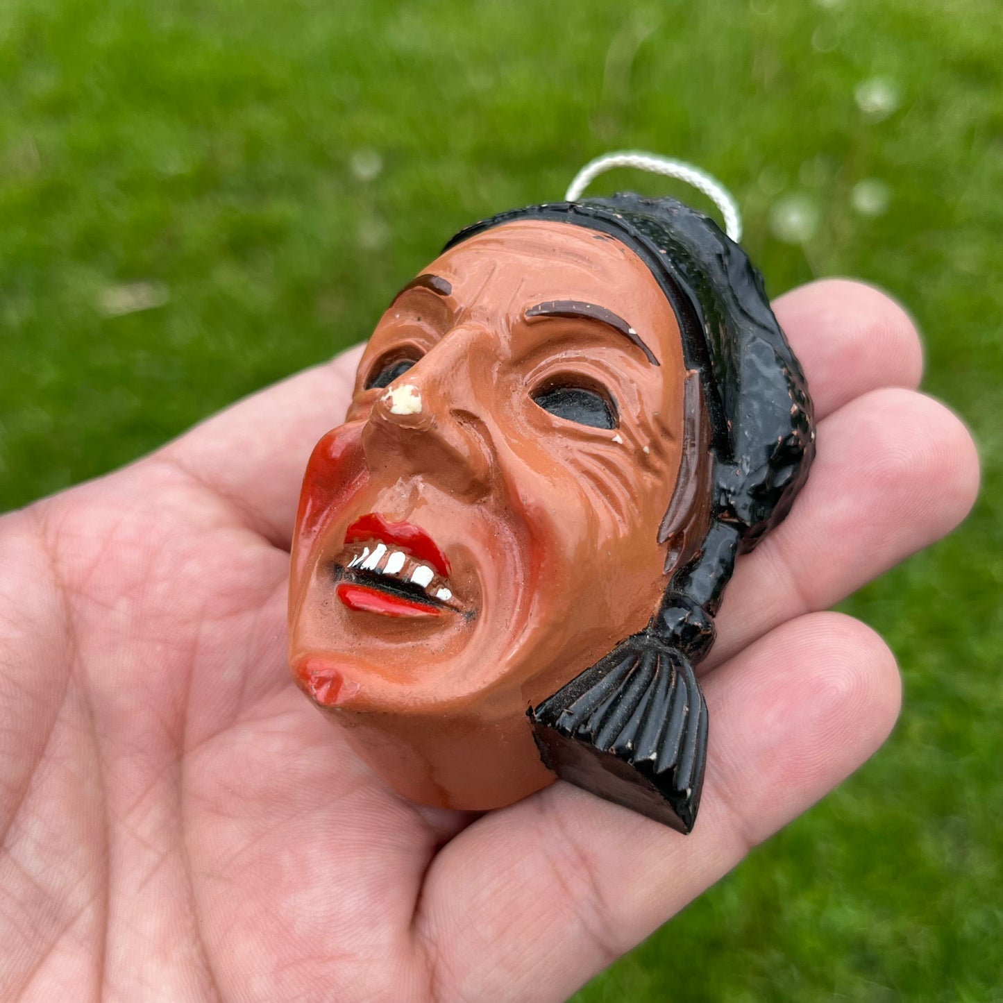 Vintage resin souvenir mask.