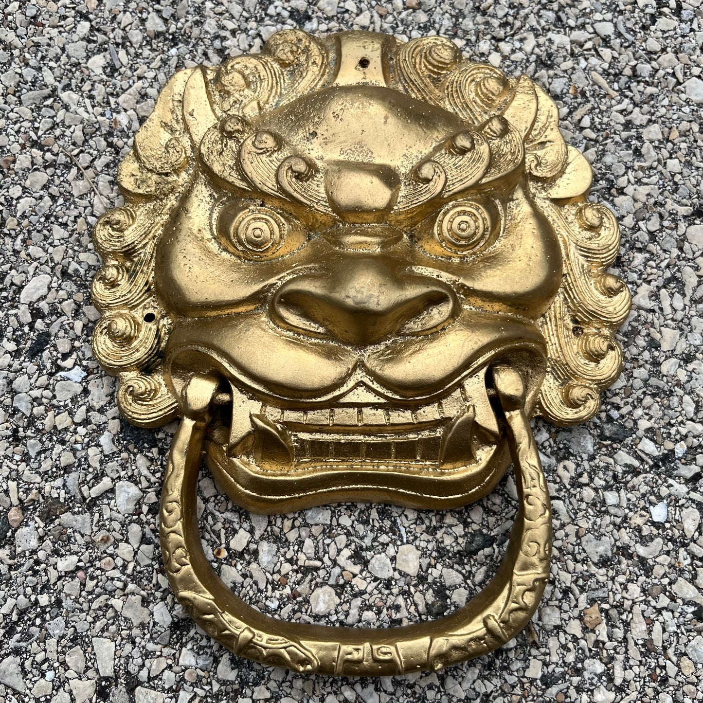 Vintage metal Foo dog door knocker.