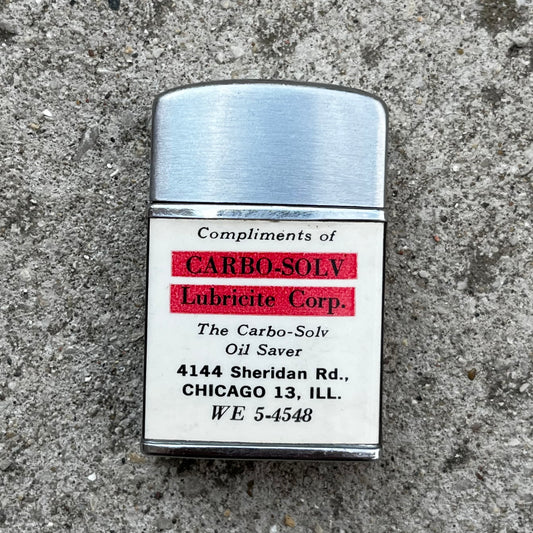 Vintage Lubricite flip lighter.