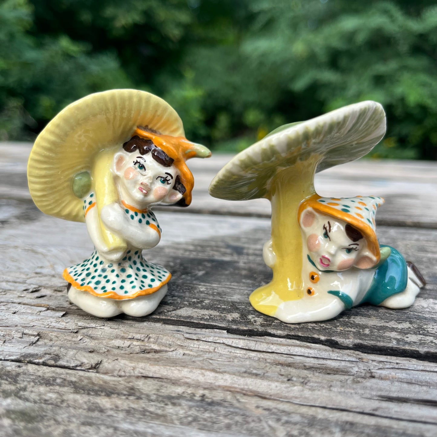 Vintage ceramic pixie figurine set.