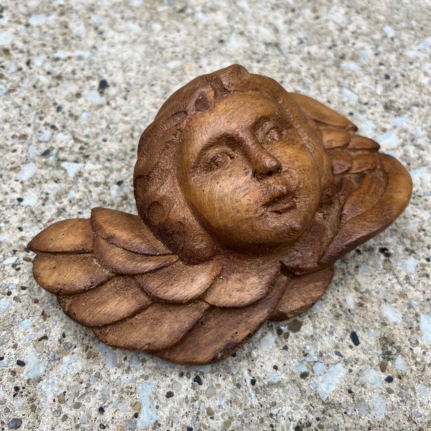 Vintage hand carved cherub.
