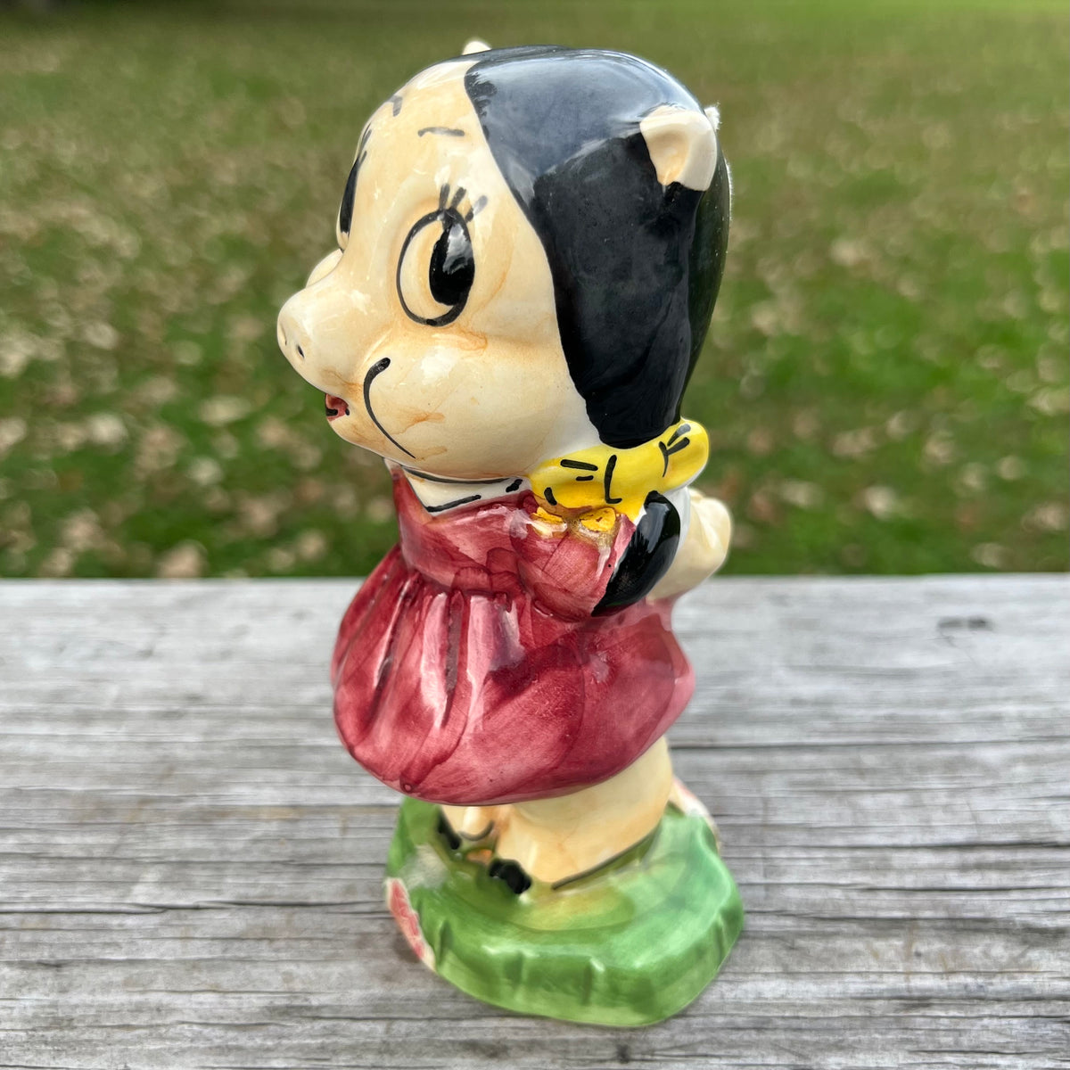 Vintage ceramic Petunia pig decanter.