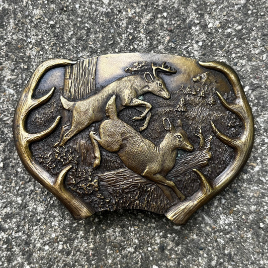 1977 Brass deer belt buckle.