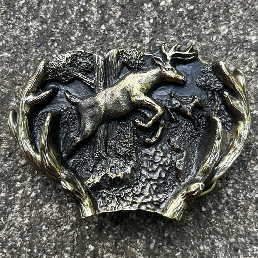 1982 Brass deer belt buckle.