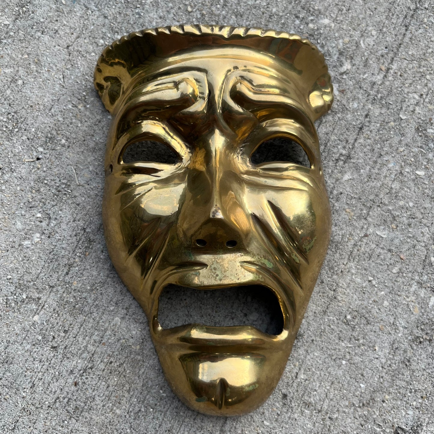 Vintage brass drama mask.