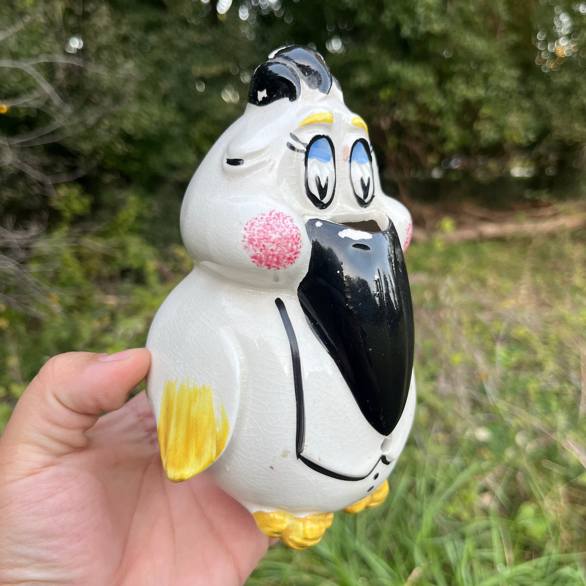 Vintage Tucan string holder.