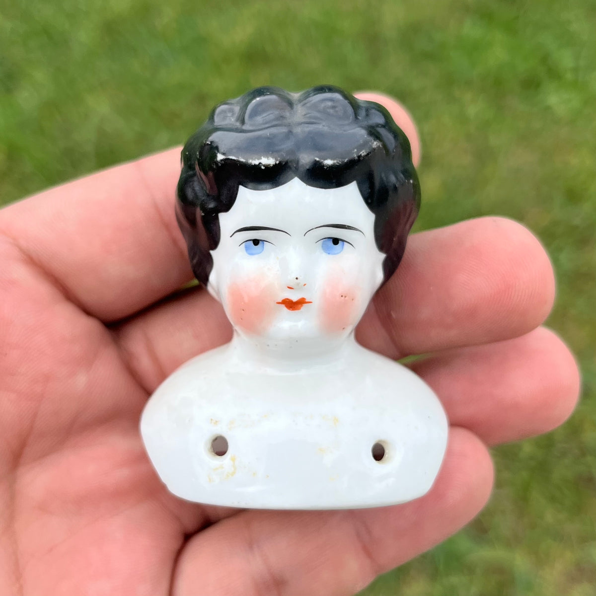 Vintage bisque doll head.
