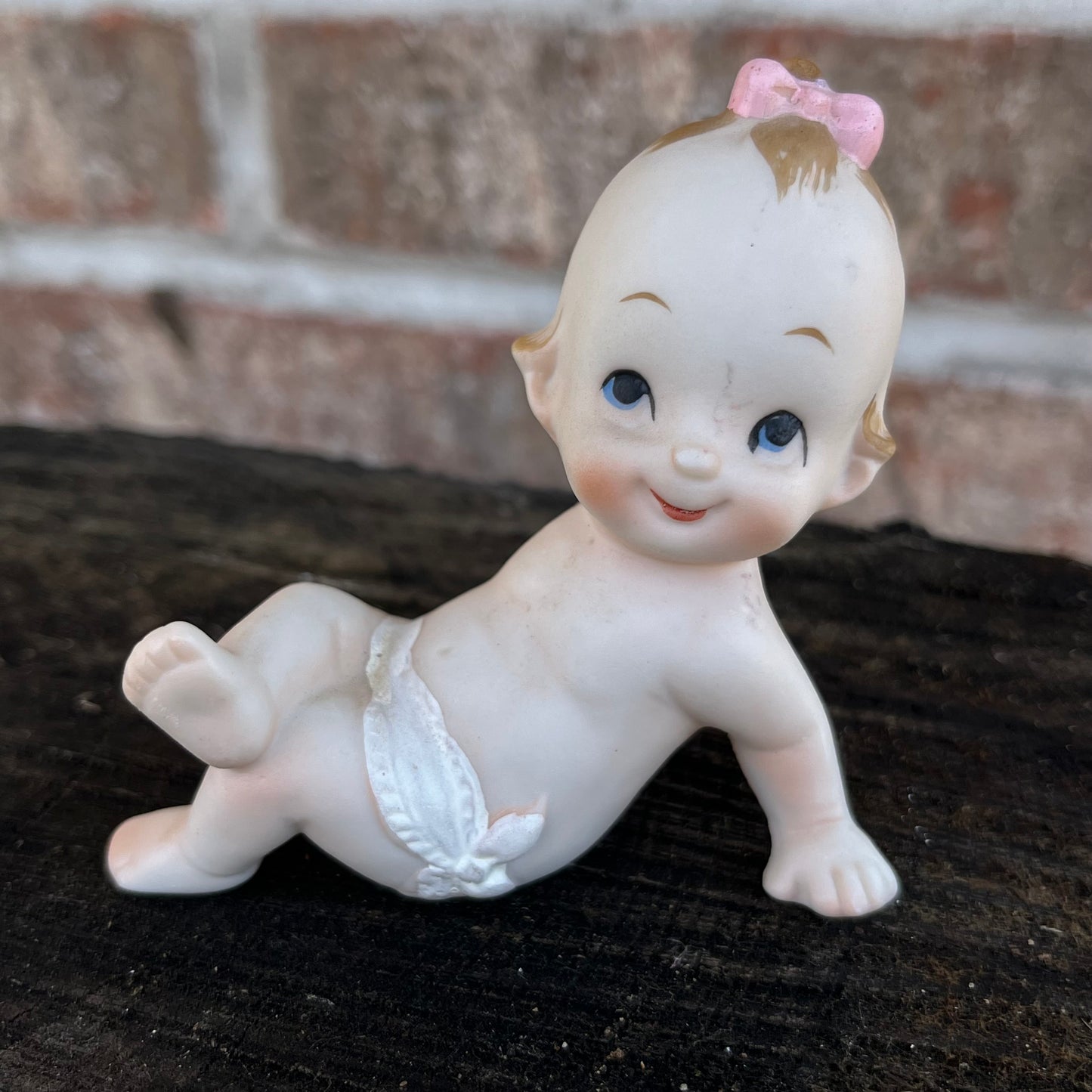 Vintage pink bow Kewpie.