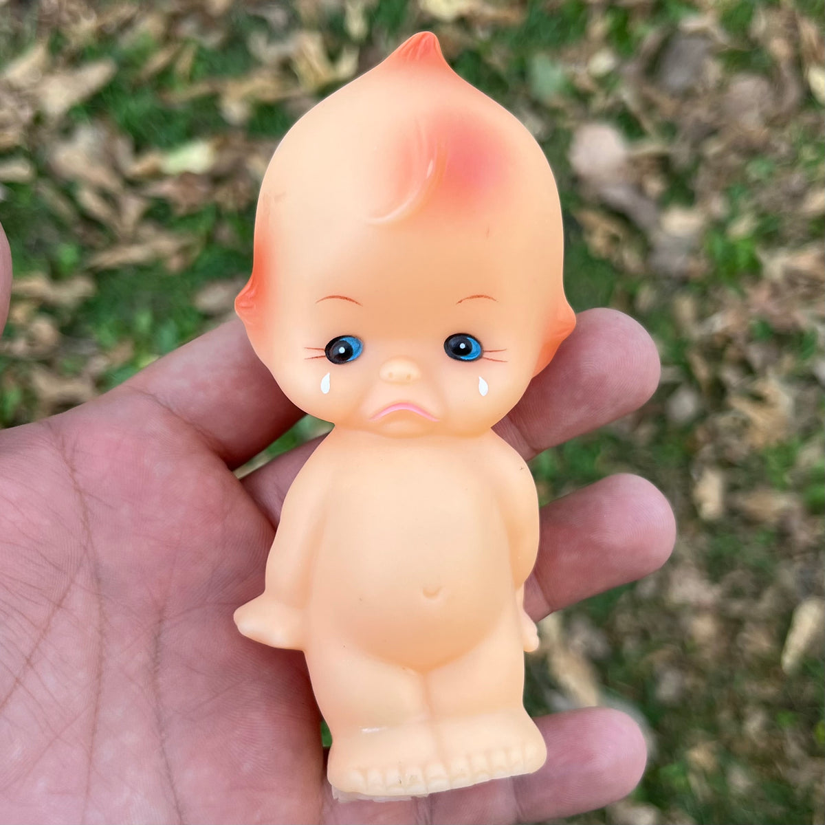 Vintage vinyl Kewpie.