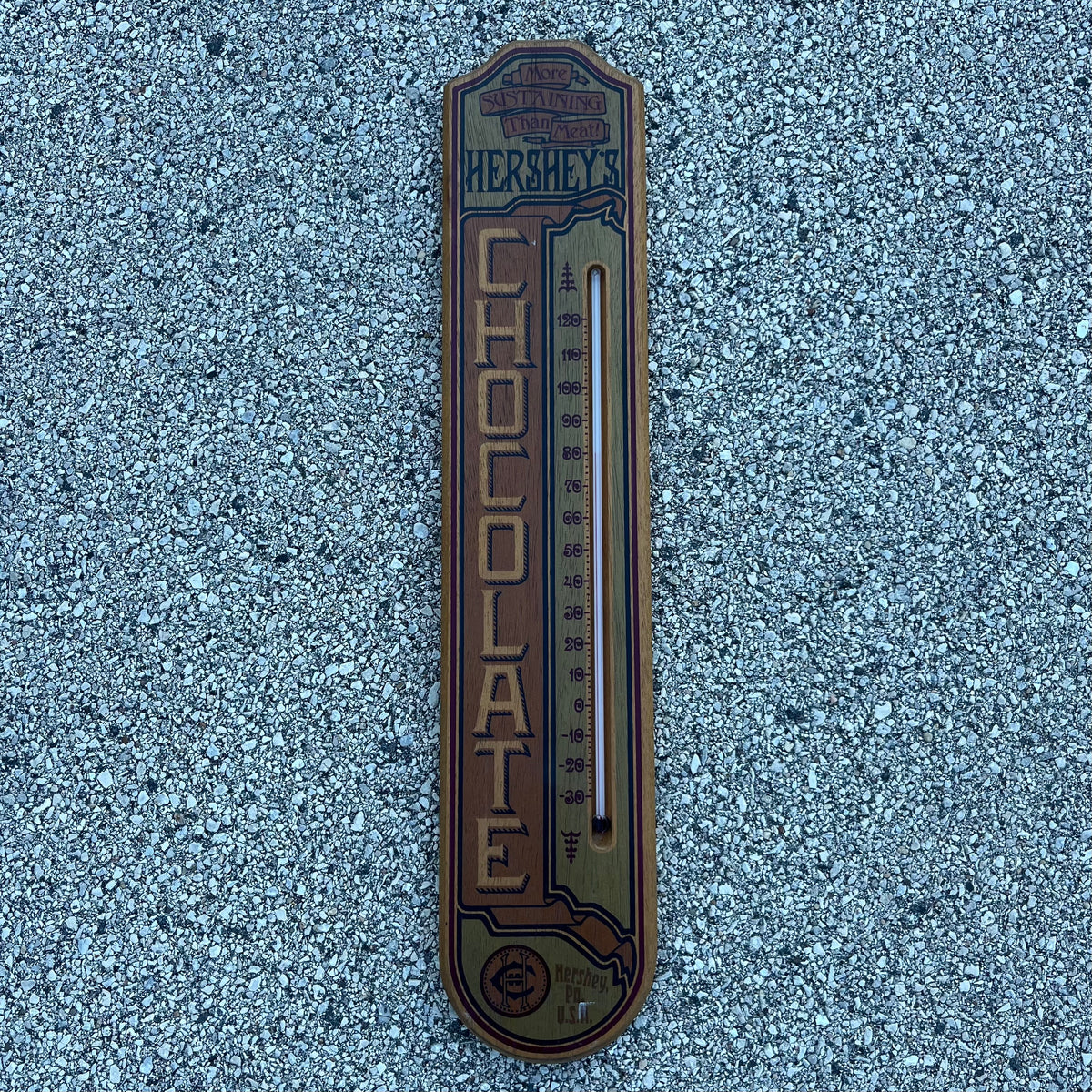Vintage wooden Hershey’s chocolate thermometer.