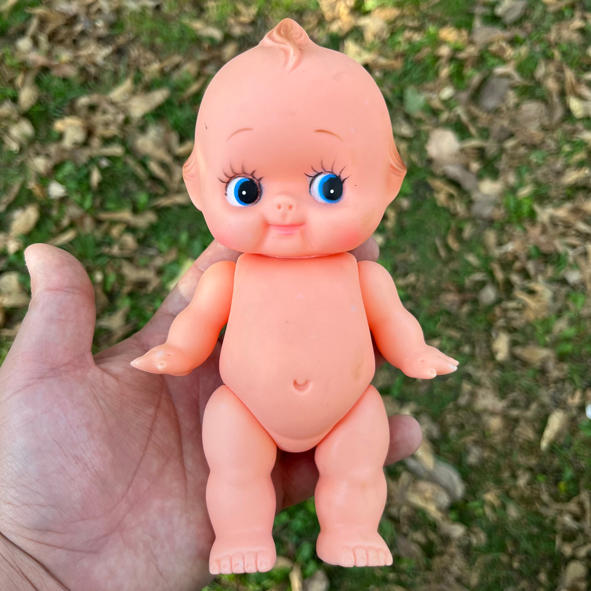 Vintage vinyl Kewpie.