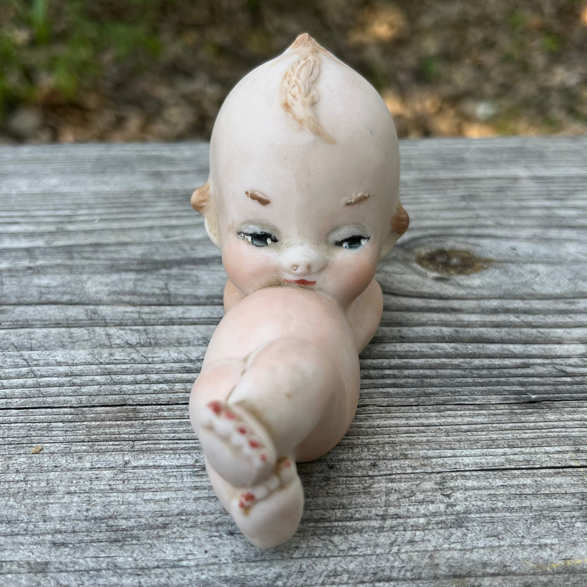 Vintage sleepy Kewpie.