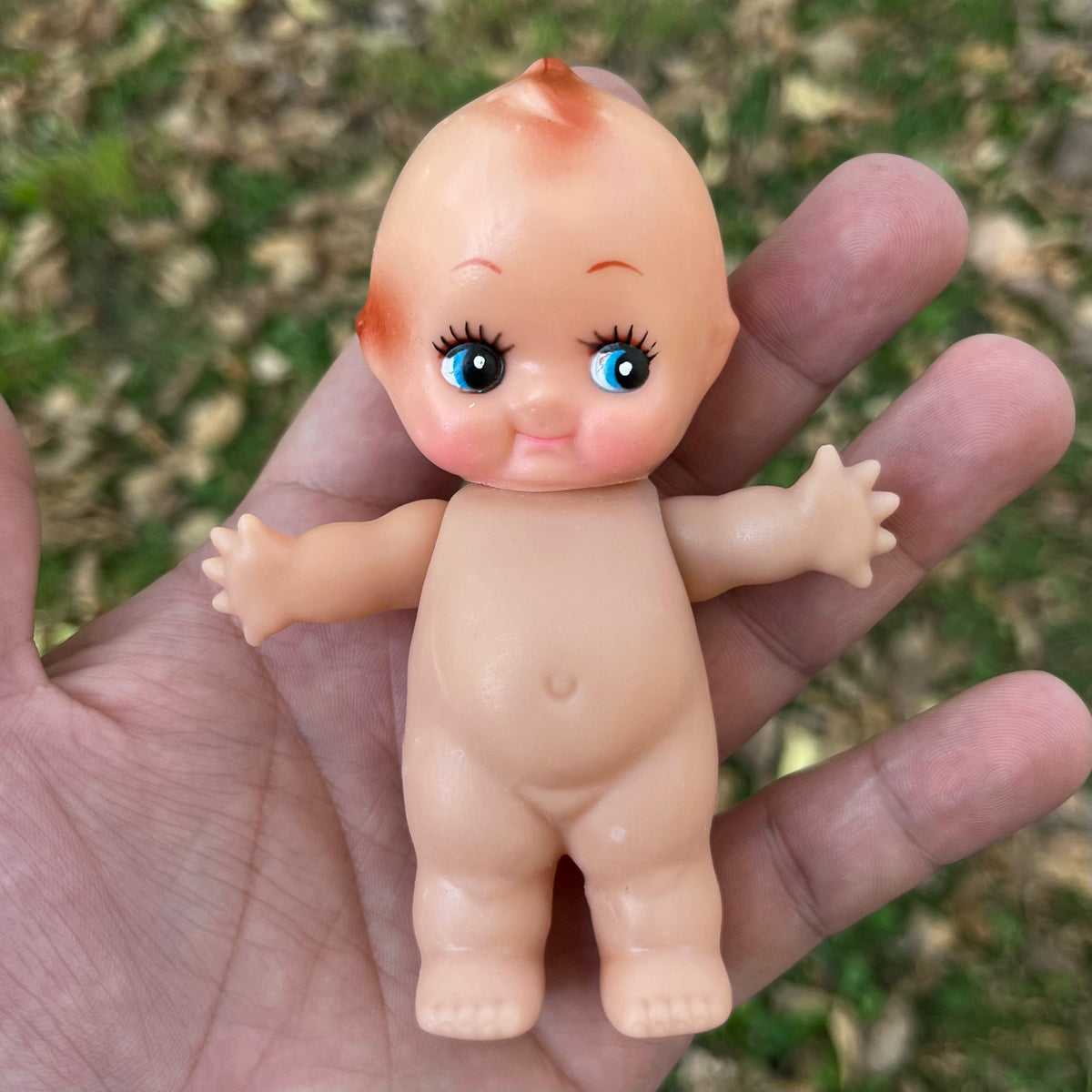Vintage vinyl Kewpie.