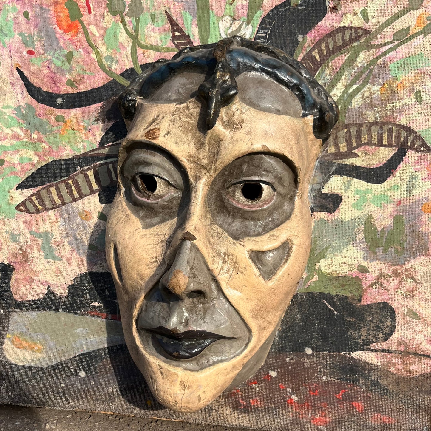 1960s Mixed media Día de los Muertos mask on canvas.