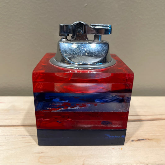 Vintage resin cube lighter.