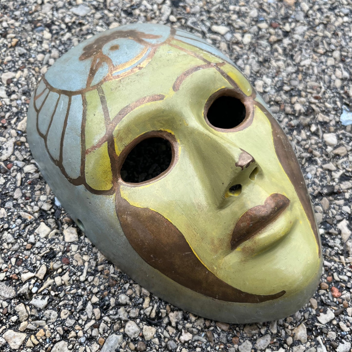Vintage brass bird mask.