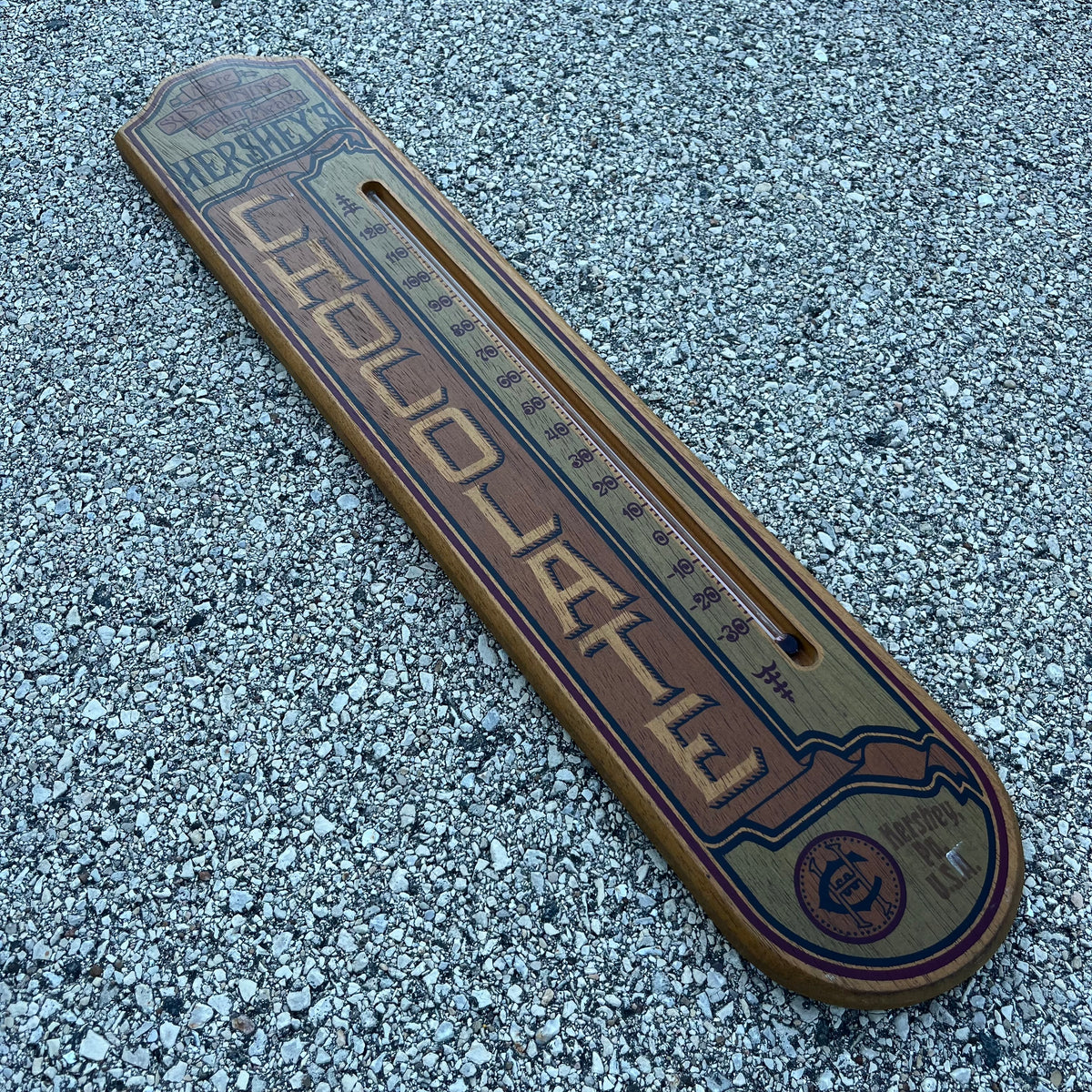 Vintage wooden Hershey’s chocolate thermometer.