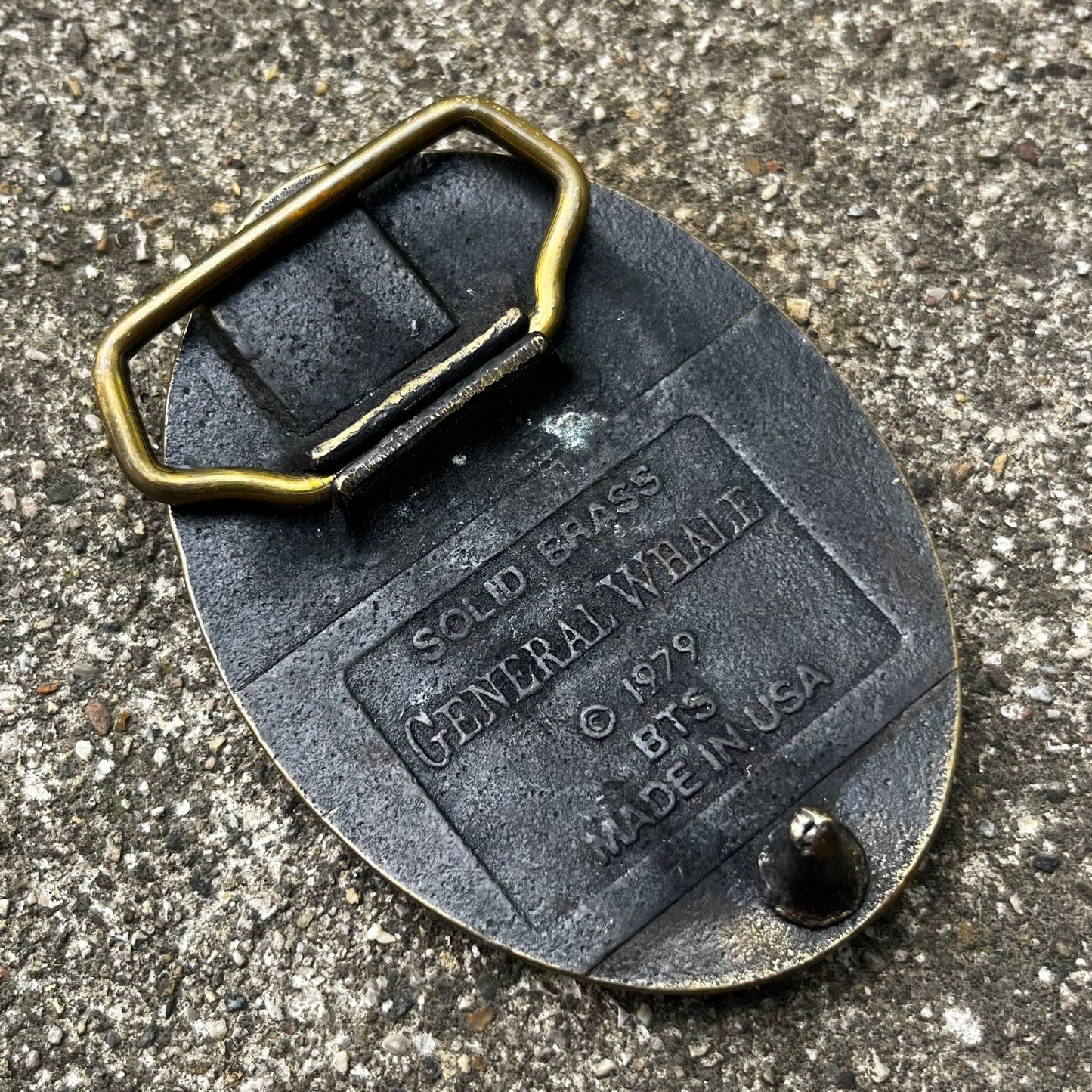 1979 General whale belt buckle.