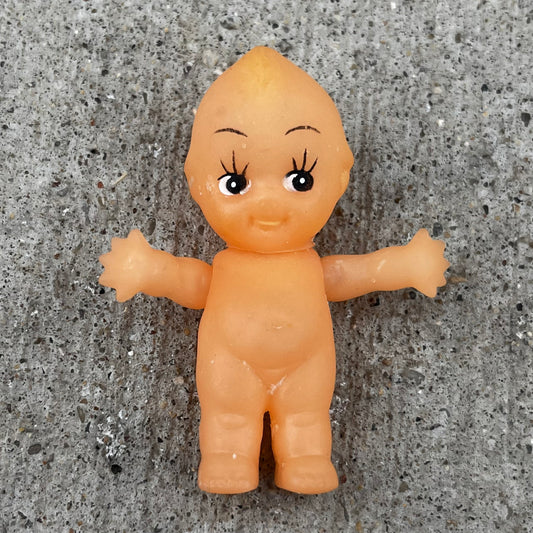 Vintage vinyl Kewpie doll.