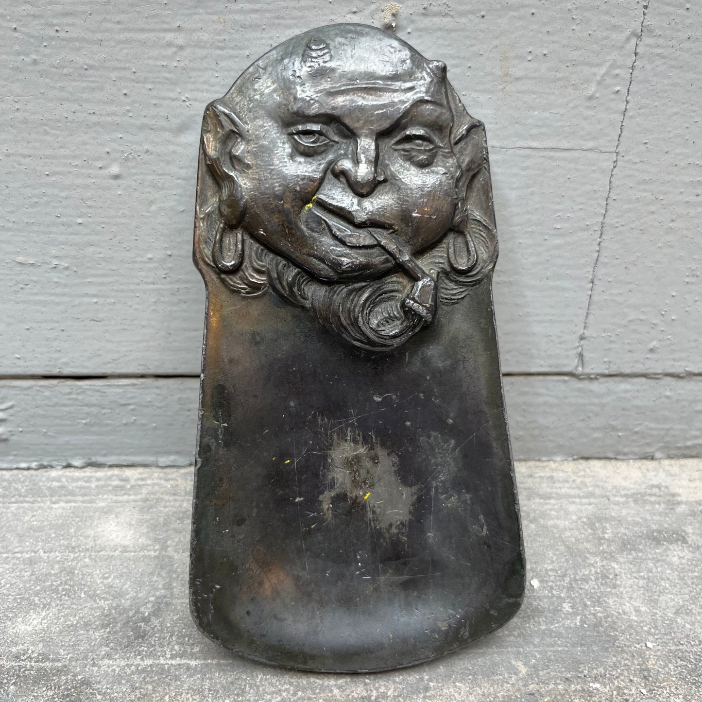 Vintage pewter pipe smoking devil dish.