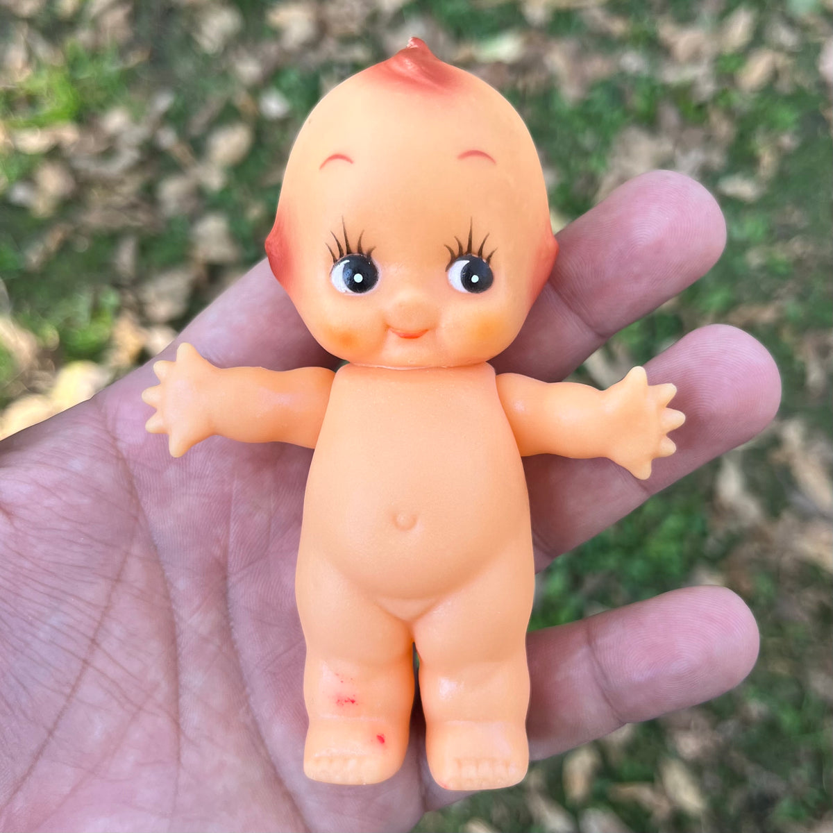 Vintage vinyl Kewpie.