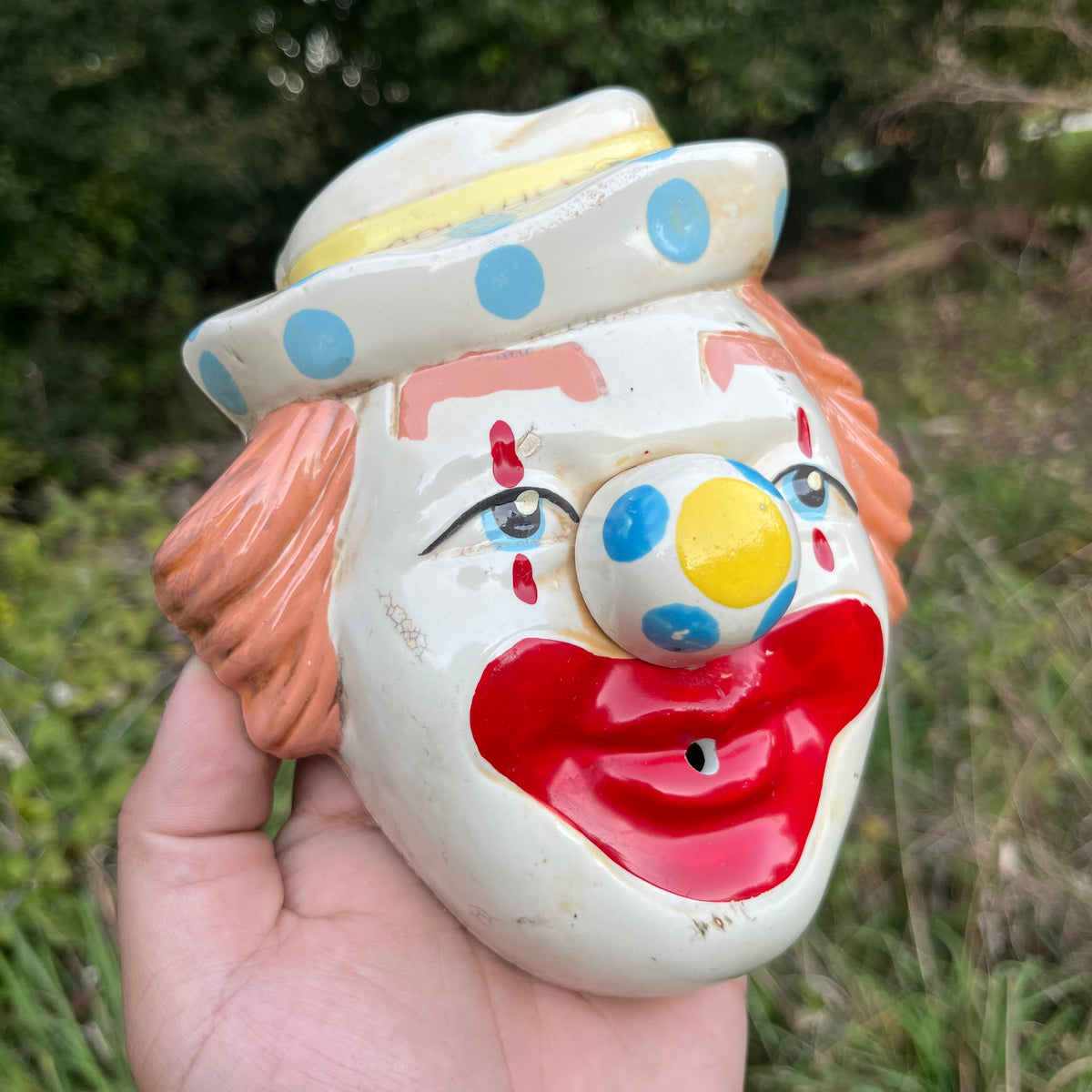 1950s Clown head string holder.