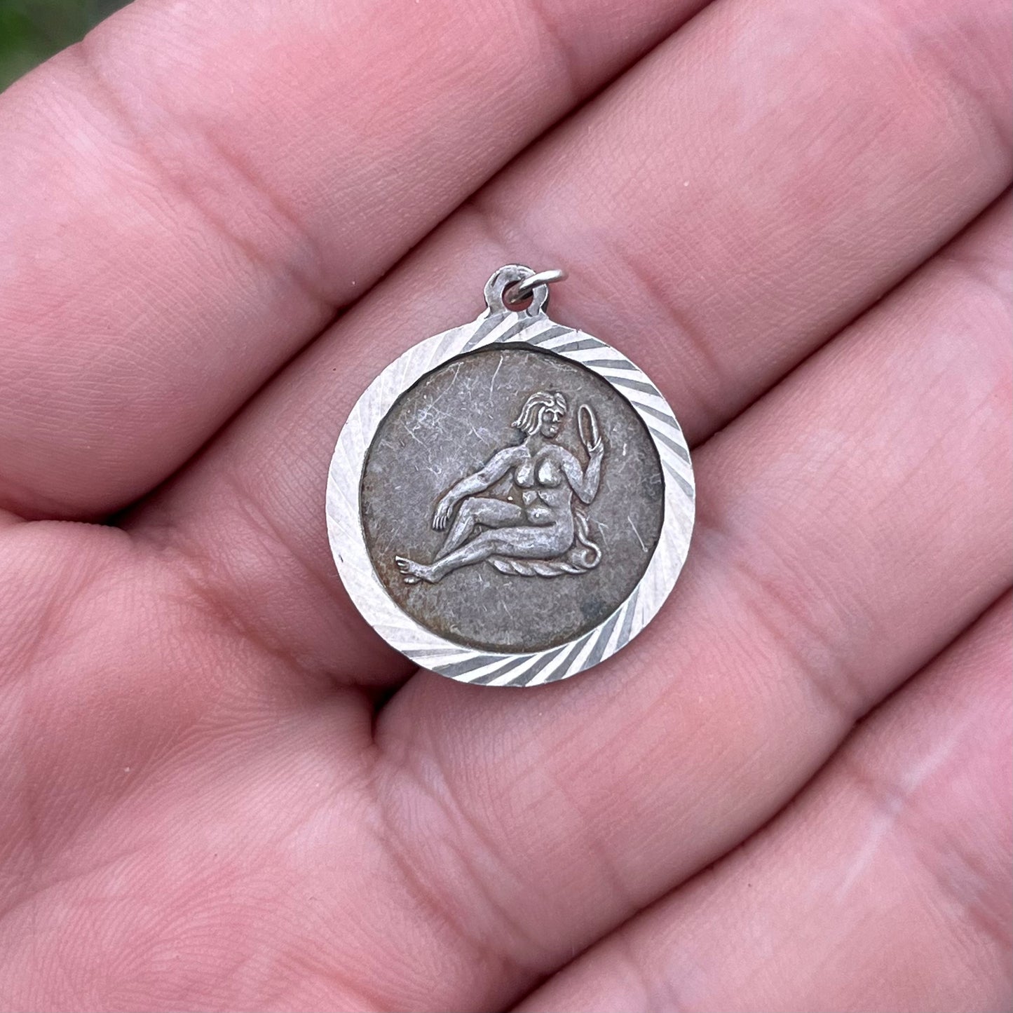 Vintage Sterling silver Aquarius charm.