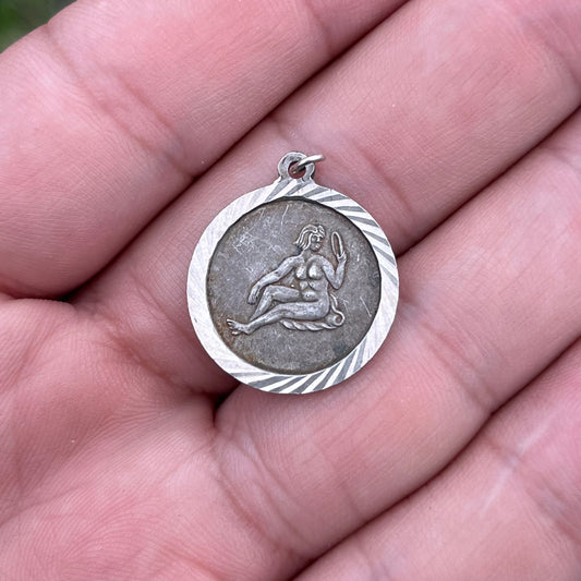Vintage Sterling silver Aquarius charm.
