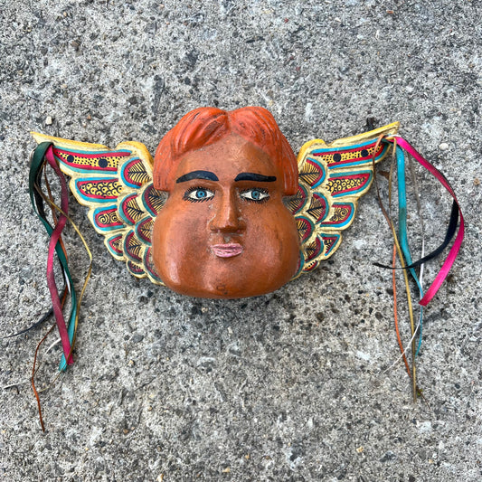 Vintage decorative cherub wood carving.