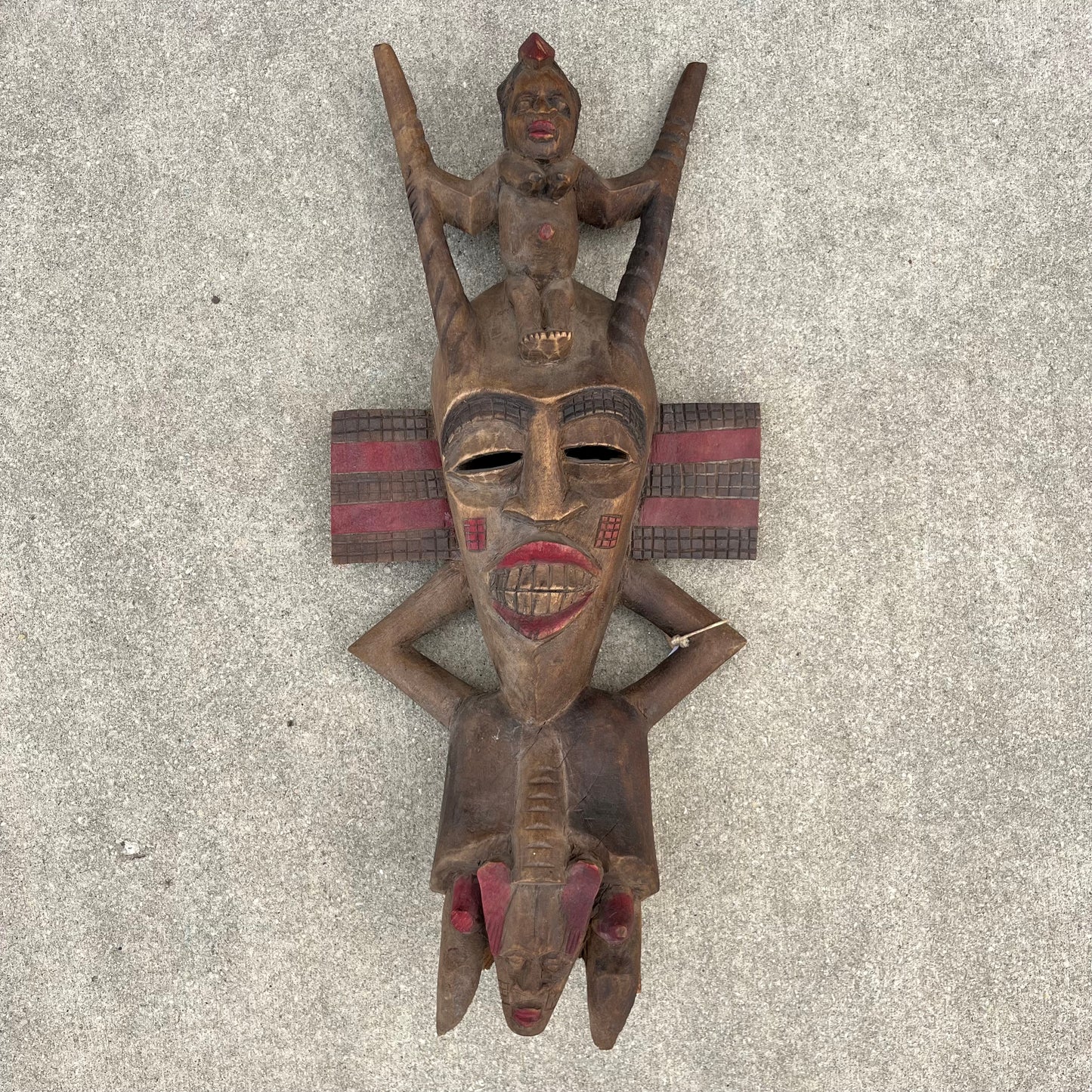 Vintage hand carved Senufo Kpelie mask.