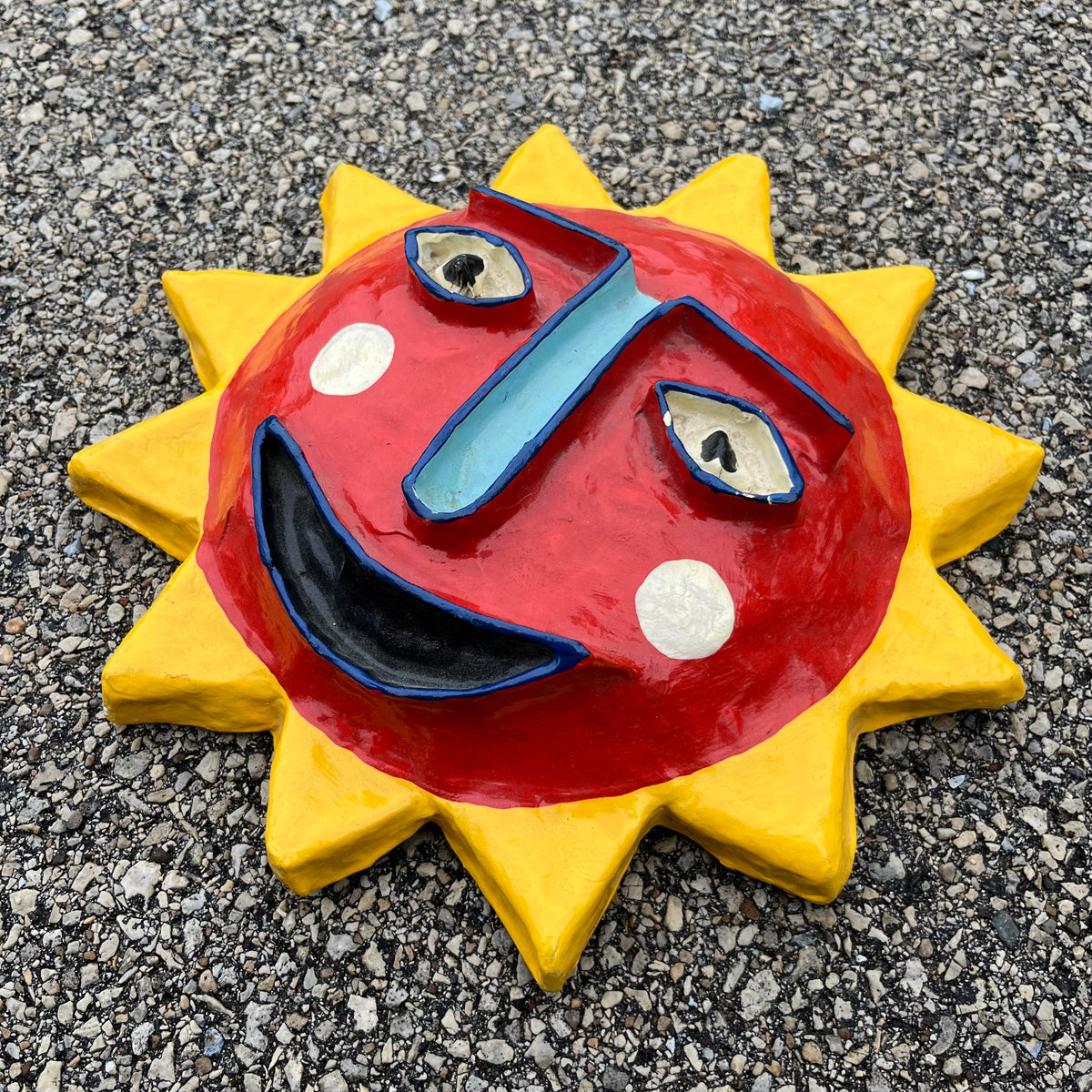 Vintage paper mache sun mask.