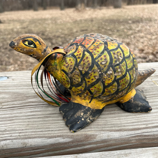 Hand crafted turtle gourd maraca.