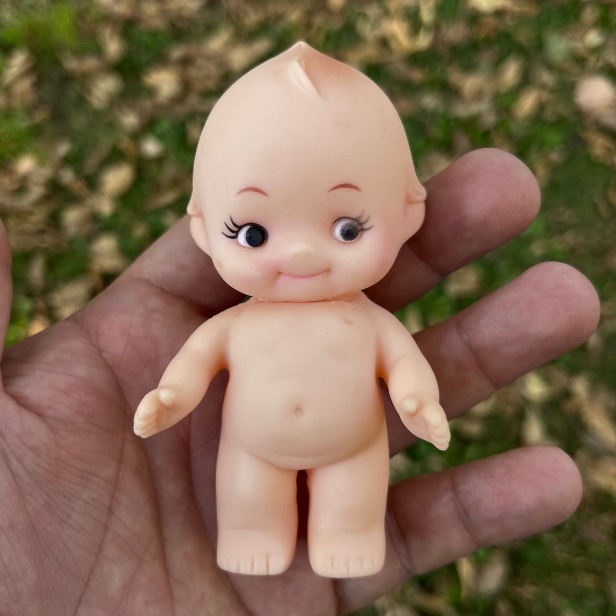 Vintage vinyl Kewpie.