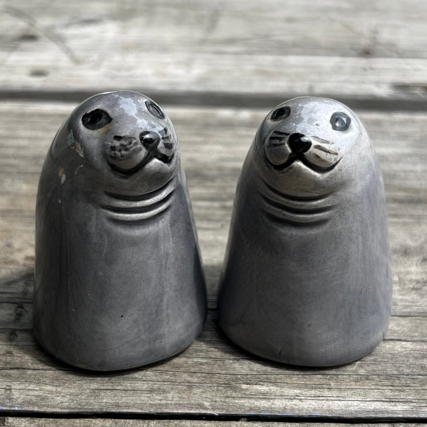 Vintage seal salt n’ pepper shakers.