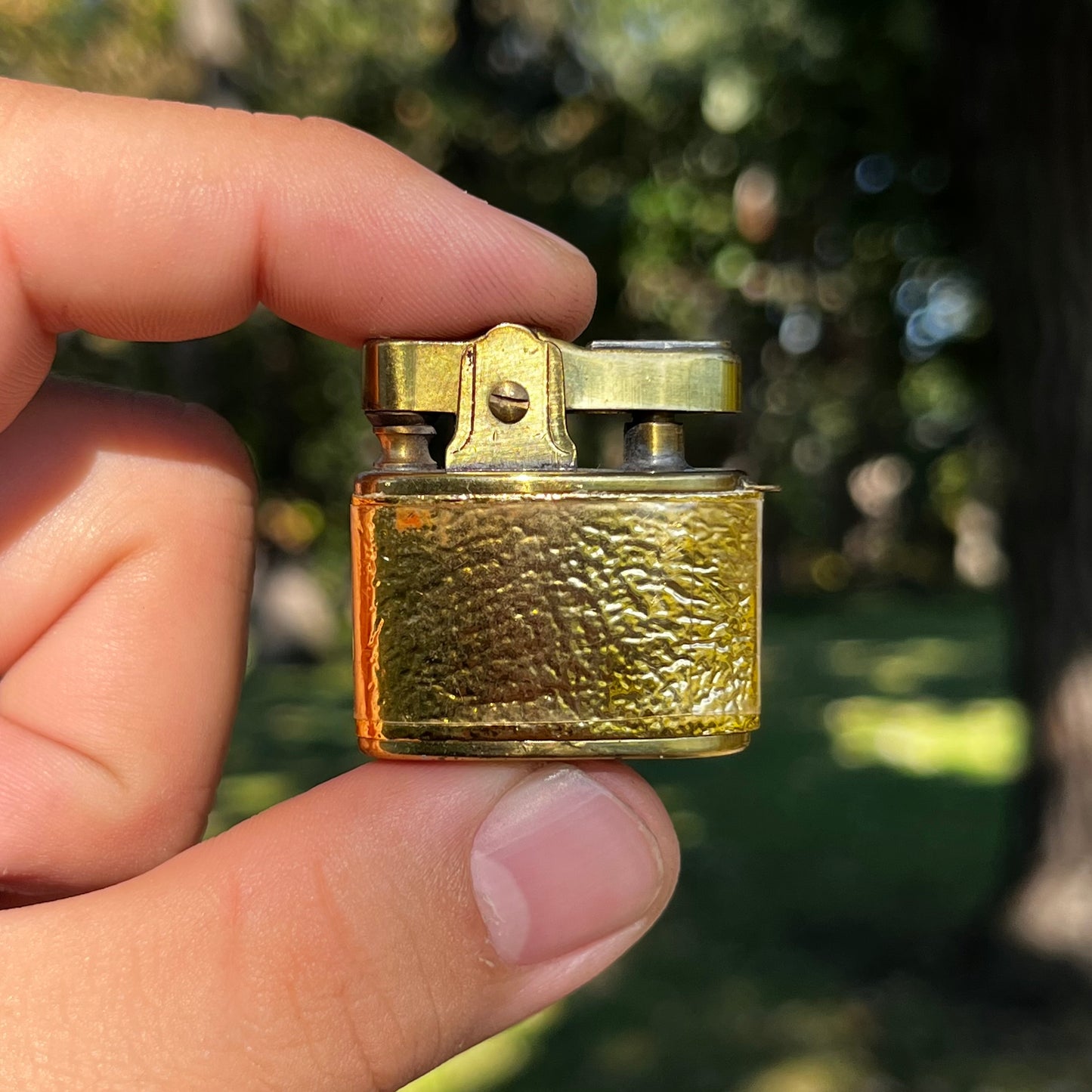 1950s Gold tone Penguin lighter.