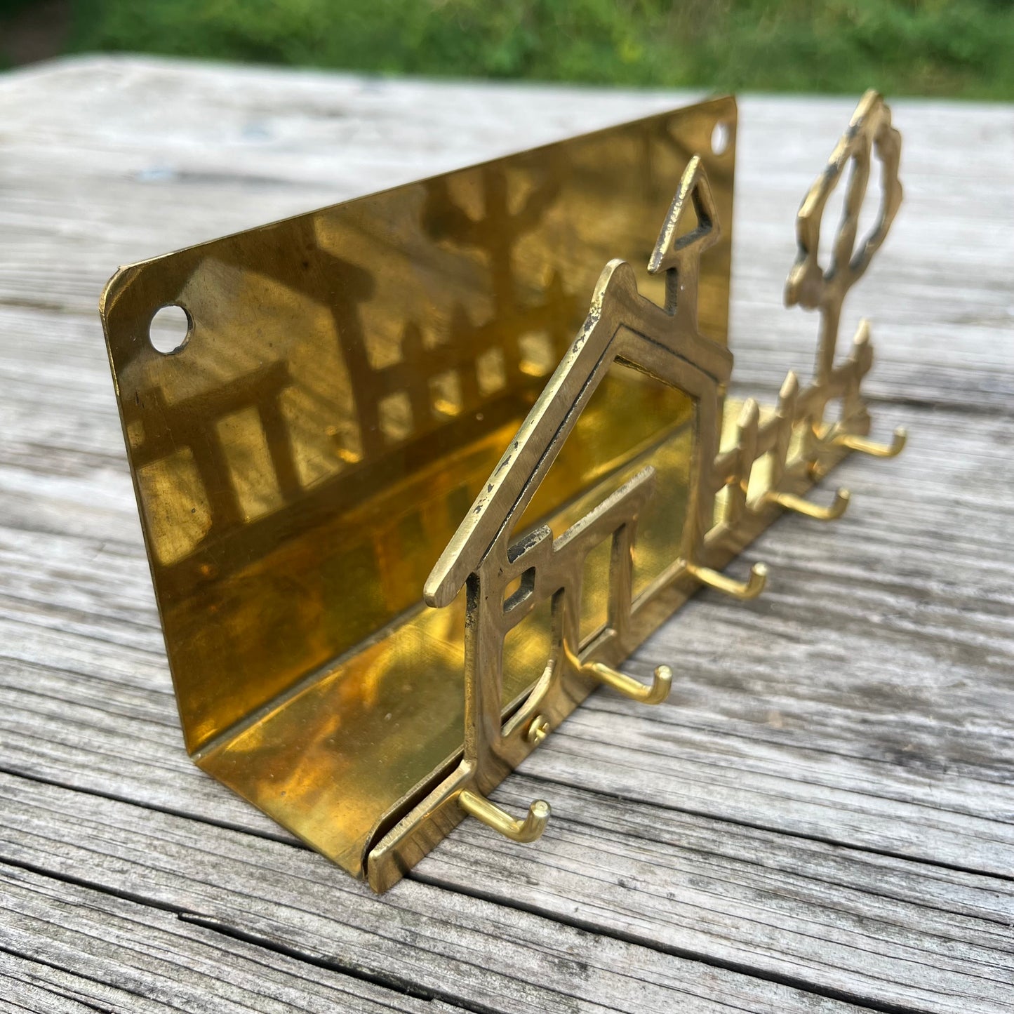 Vintage brass house key holder.